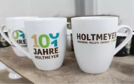 Kaffe-Tee Becher bedrucken lassen für die Firma Holtmeyer